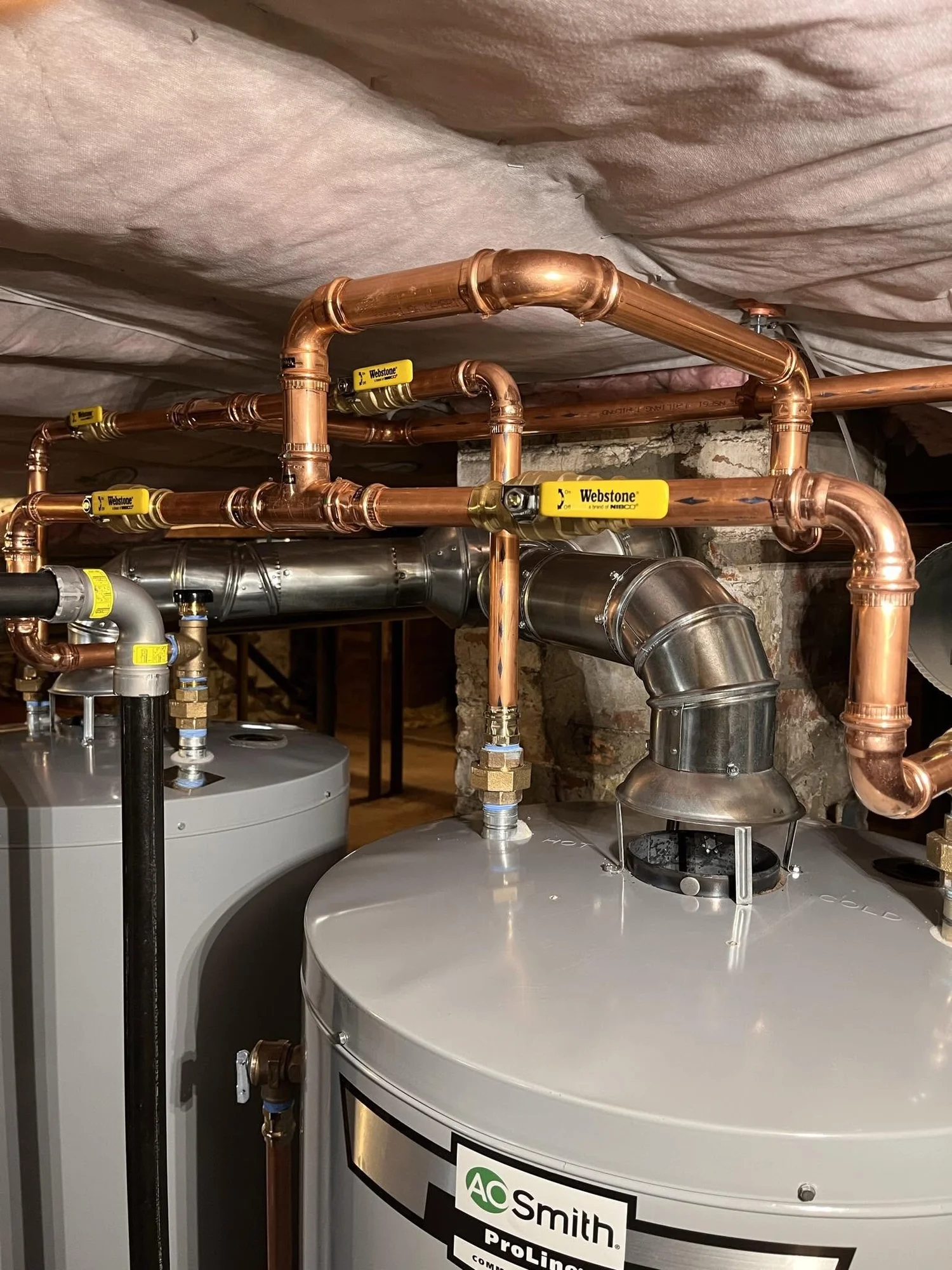Water heater and copper supply piping installed by Seamus Browne